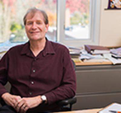 Dr. Gombart in his office